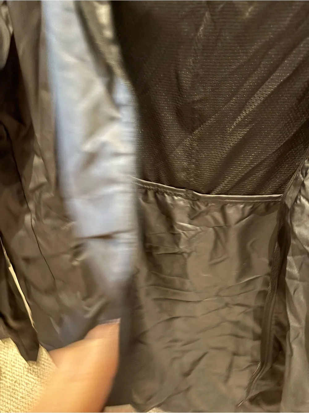 Nike Black Hooded Rain Jacket with Reflective Swoosh. Longer in back, hood.